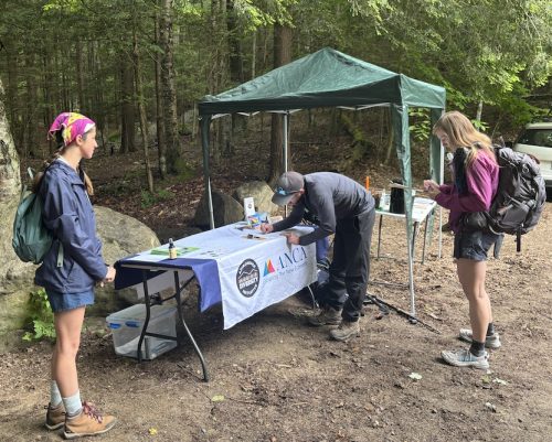 Leigha conducts surveys with hikers to the Adirondack High Peaks area.